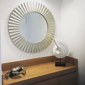 A round mirror installed on the wall