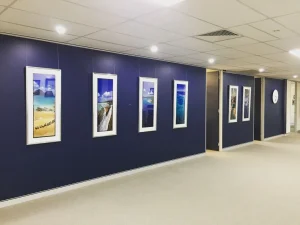 A gallery with arts hanging on the wall